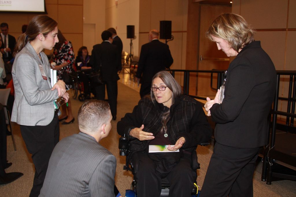 Caitlin Urbain, Bob Tavernier, Marca Bristo & Jill Bradley talk after the Disability Inclusion Opportunity Summit