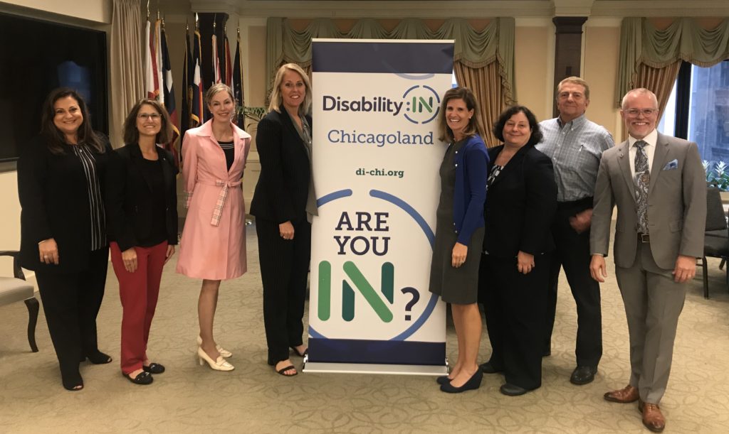 Disability:IN Chicagoland Board members Andrea Beirne, Tricia Myers, Lora laverty, Nancy Nauheimer, Dennis Rossow & Scott Hoesman, stand with Jill Houghton, Disability:IN CEO & Laura Wilhelm Disability:IN Chicagloand Executive Director